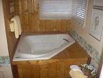 3 Bedroom 2 bath spa cabin with Jacuzzi - Full kitchen and fireplace. Pet friendly #11,17,26 Photo 6